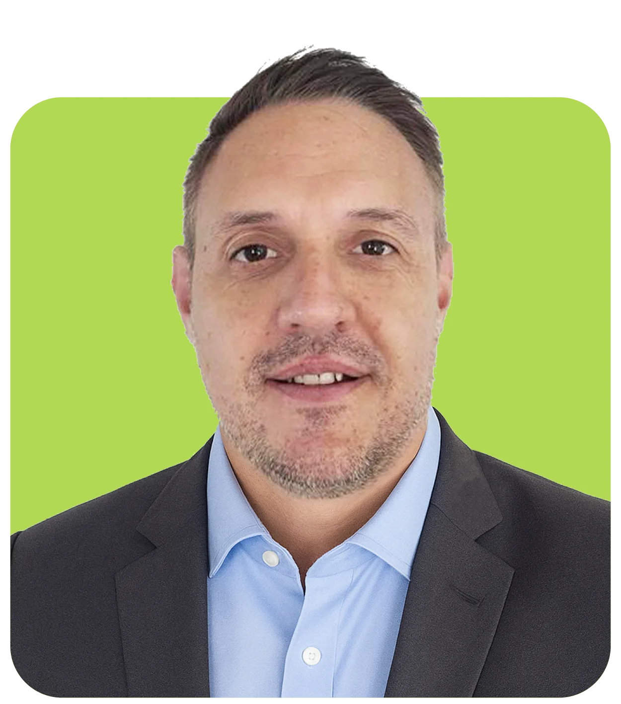 paul elcome from maintel headshot on green background